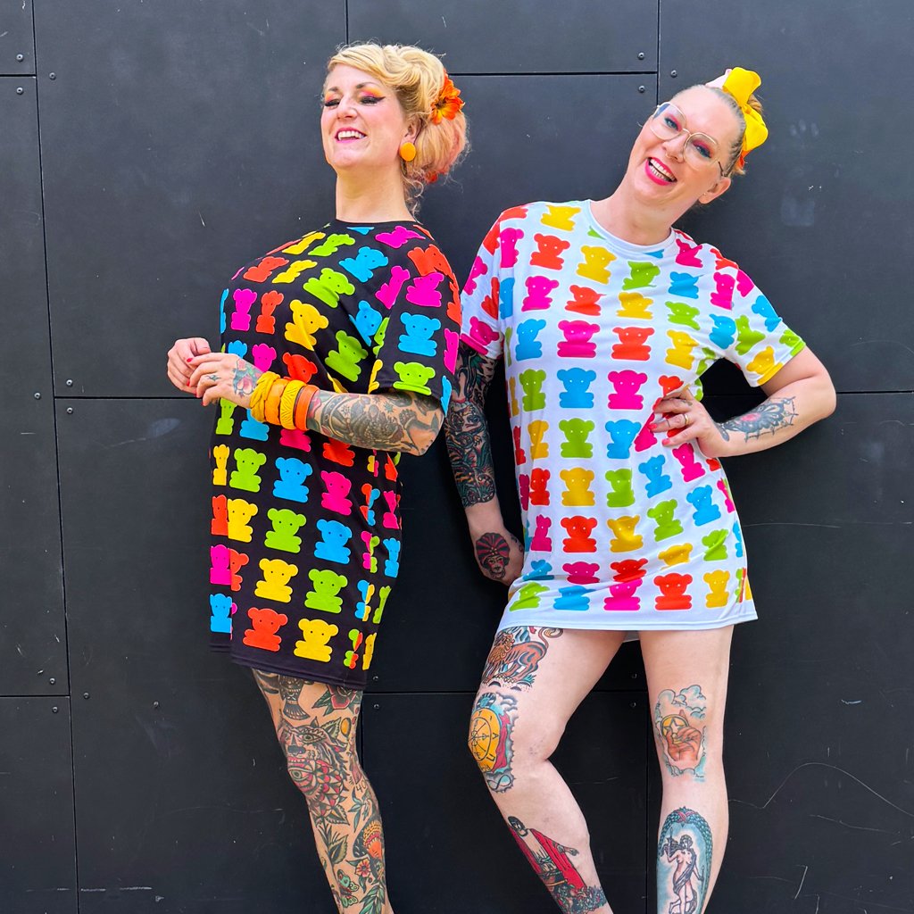 Two women in colorful t-shirt dresses by SHALMIAK with design: SWEET TEDDY.