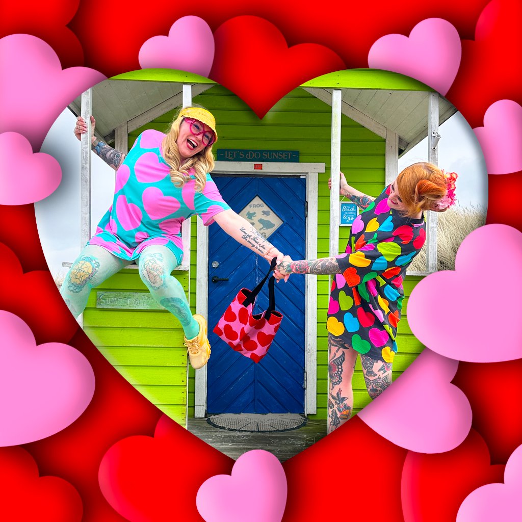 Two women, colorful outfits, and a lot of hearts.