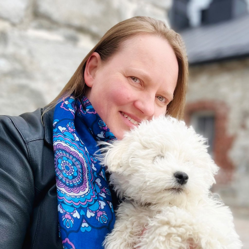 Designer Sari Ahokainen and her dog Pätkis.